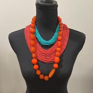 Set of 3 colorful beaded necklaces.